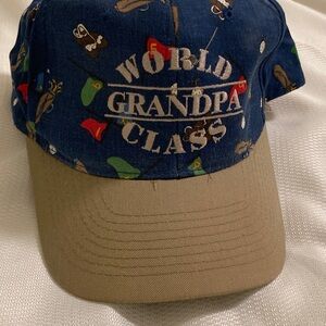 World Class Grandpa logo on hat with blue golf patterned theme. Great condition